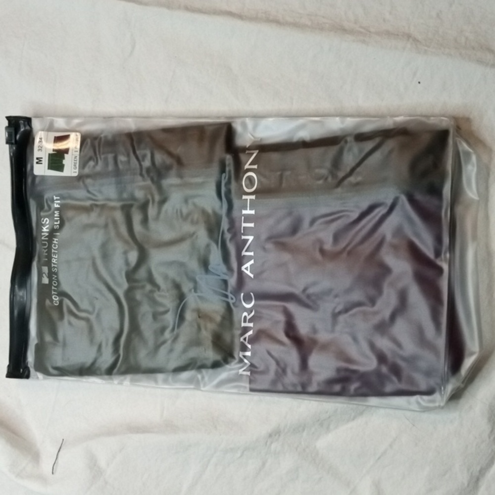 Marc Anthony Black and Purple Trunks